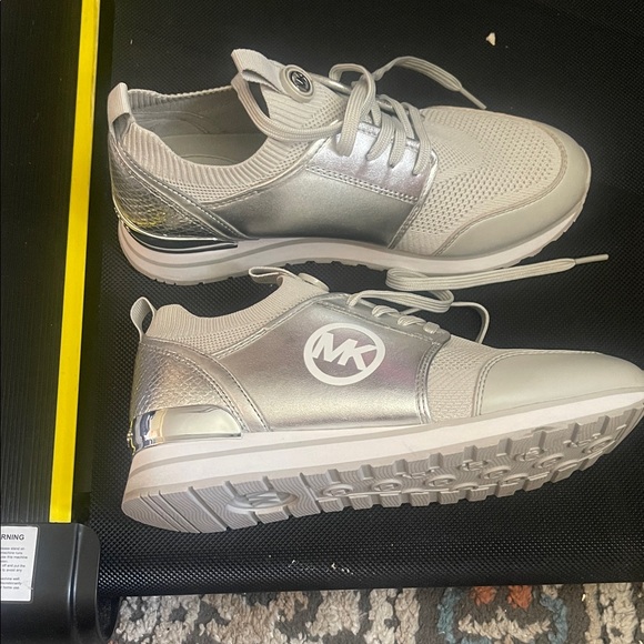 Michael Kors Metallic Silver and White Sneakers - Picture 2 of 3